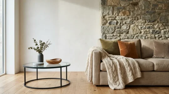 Cozy modern living room showcasing layered textures and warm neutral tones creating depth and comfort