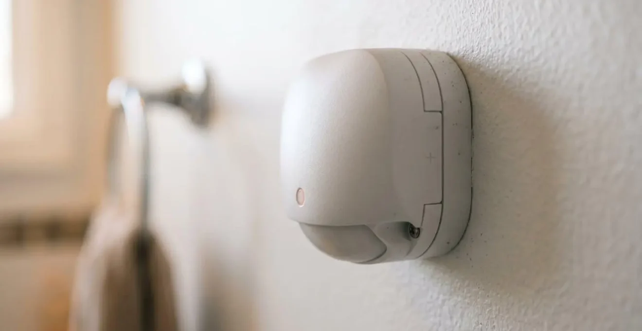 Close-up detail of occupancy sensor technology detecting subtle human presence