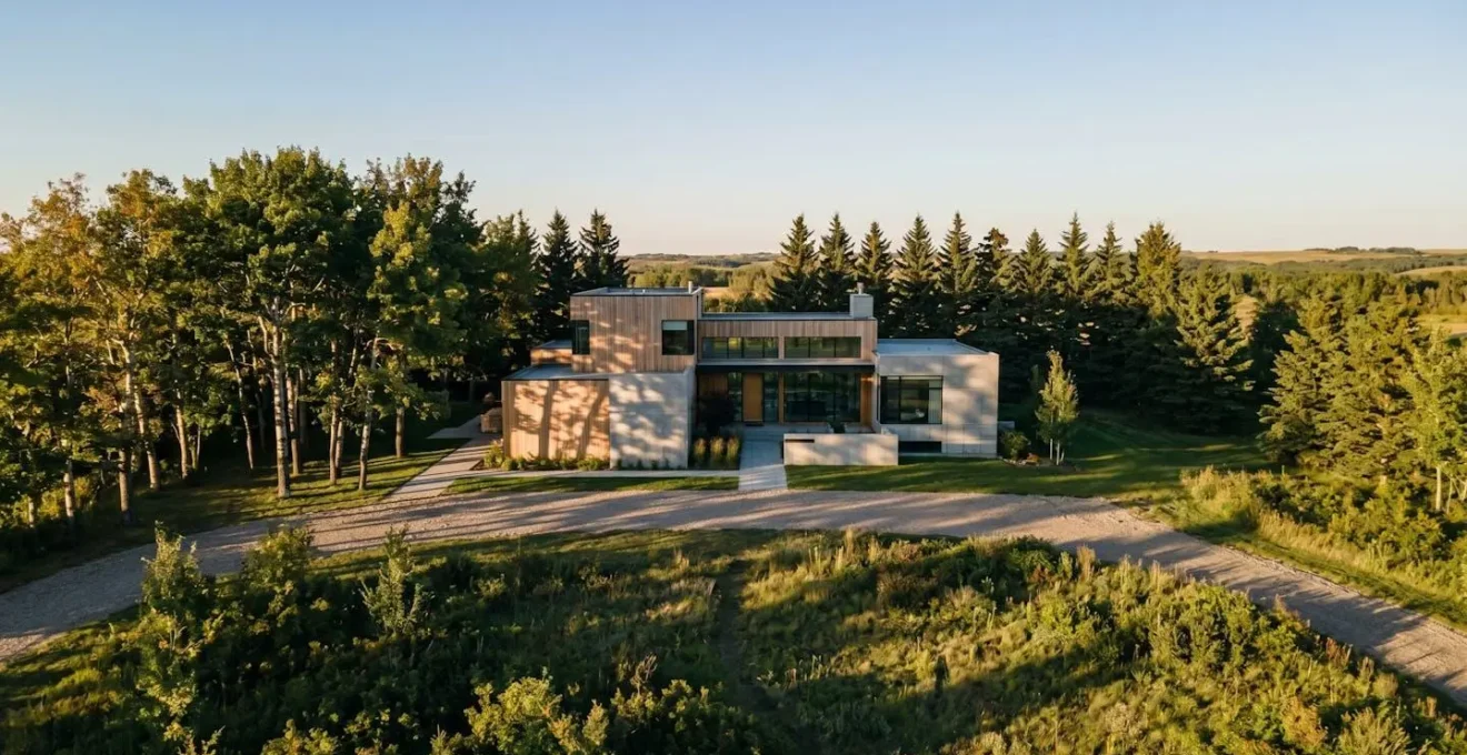 Wide aerial perspective of residential property showing natural landscaping patterns and solar exposure zones