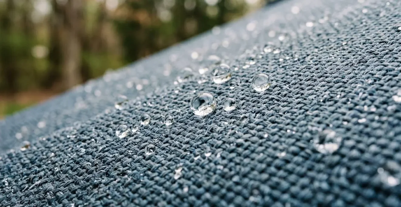 Close-up macro detail of awning fabric showing proper tension and water-shedding angle